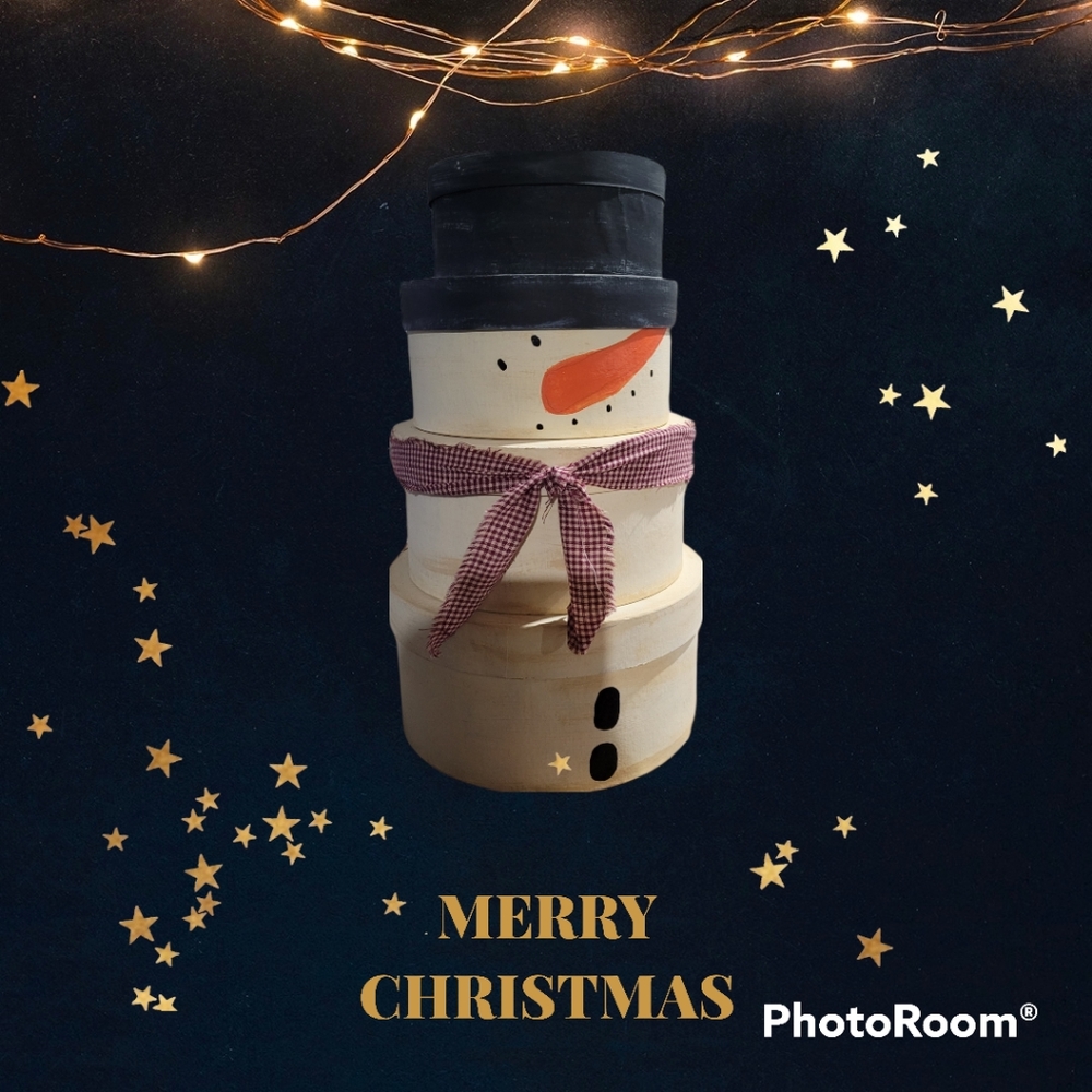 Primitive snowman stacking boxes